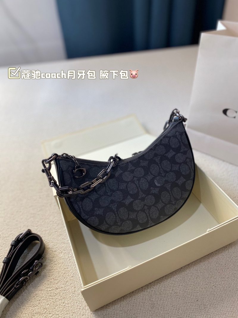 La borsa ascellare Coach Crescent Bag con scatola pieghevole è davvero un capolavoro. In termini di design