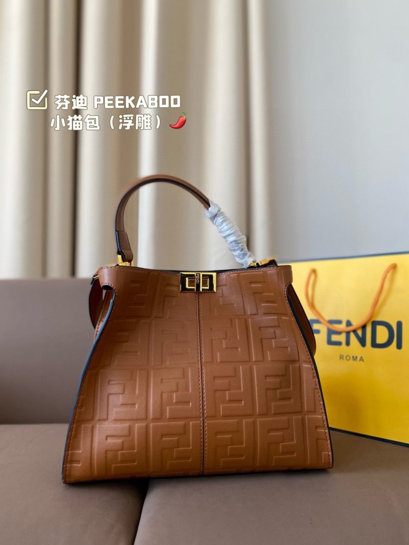 Fendi's 88th anniversary FENDI handbag has a smooth texture and topstitching. Both compartments open and close with the classic ABOO twist lock. Hard dividers and one zippered pocket. Single handle