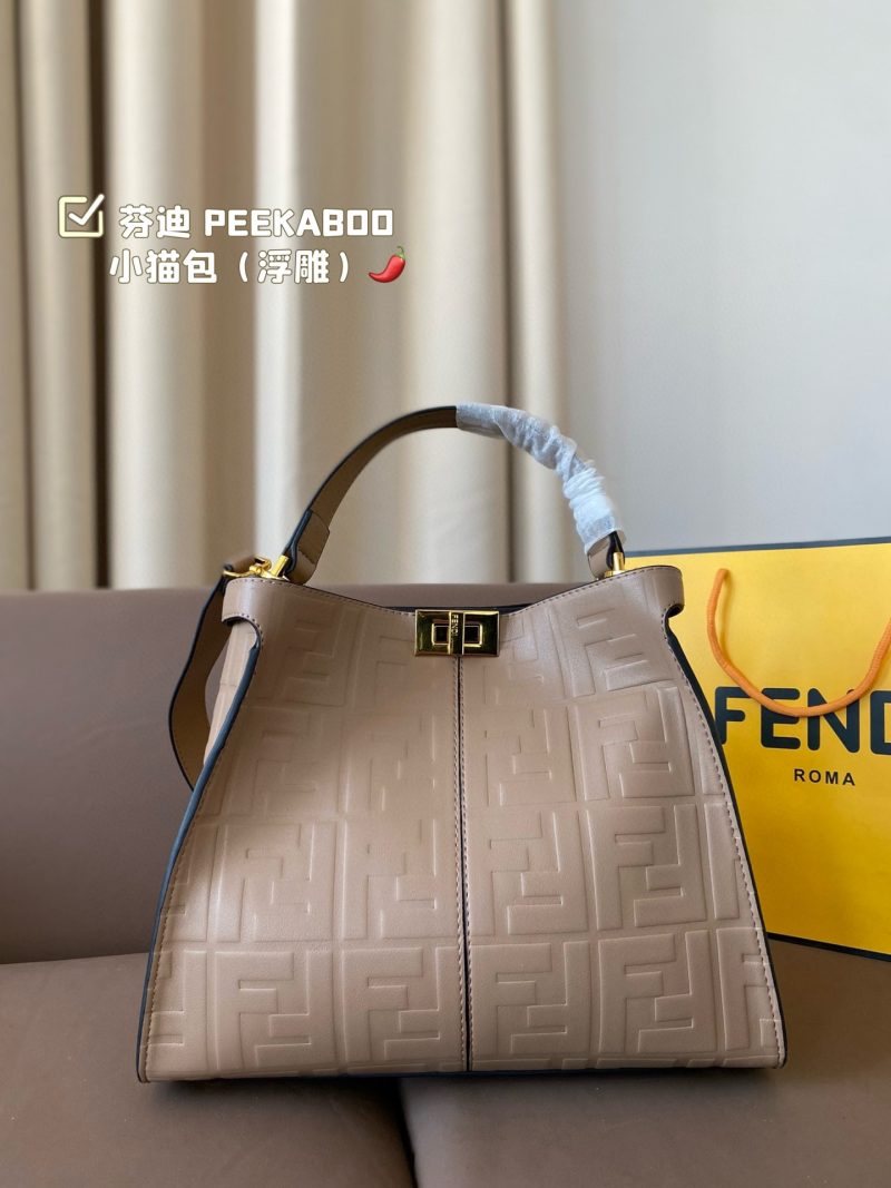 Fendi's 88th anniversary FENDI handbag has a smooth texture and topstitching. Both compartments open and close with the classic ABOO twist lock. Hard dividers and one zippered pocket. Single handle