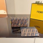 Fendi's popular three-in-one built-in card holder and coin purse