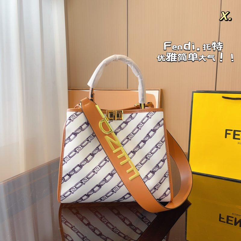 Fendi's 88th anniversary FENDI handbag has a smooth texture and topstitching. Both compartments open and close with the classic EEKABOO twist lock. Hard dividers and one zippered pocket. Single handle