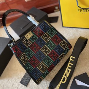 Fendi's 88th anniversary FENDI handbag has a smooth texture and topstitching. Both compartments open and close with the classic EEKABOO twist lock. Hard dividers and one zippered pocket. Single handle