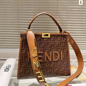 Fendi's 88th anniversary FENDI handbag has a smooth texture and topstitching. Both compartments open and close with the classic EEKABOO twist lock. Hard dividers and one zippered pocket. Single handle