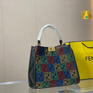 Fendi's 88th anniversary FENDI handbag has a smooth texture and topstitching. Both compartments open and close with the classic EEKABOO twist lock. Hard dividers and one zippered pocket. Single handle