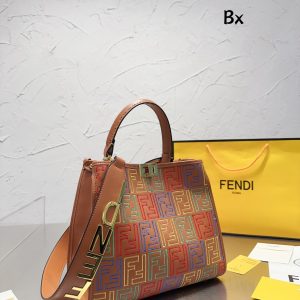 Fendi's 88th anniversary FENDI handbag has a smooth texture and topstitching. Both compartments open and close with the classic EEKABOO twist lock. Hard dividers and one zippered pocket. Single handle