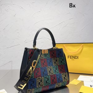 Fendi's 88th anniversary FENDI handbag has a smooth texture and topstitching. Both compartments open and close with the classic EEKABOO twist lock. Hard dividers and one zippered pocket. Single handle