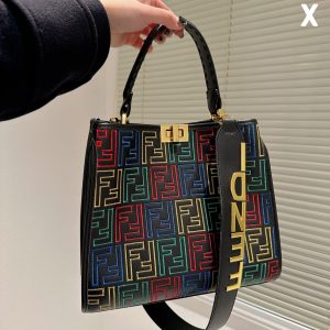 Fendi's 88th anniversary FENDI handbag has a smooth texture and topstitching. Both compartments open and close with the classic EEKABOO twist lock. Hard dividers and one zippered pocket. Single handle