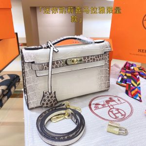 Hermes Kelly modello mini Himalayan modello top personalizzato La bellezza unica di Hermes Kelly fa sì che la forma della borsa mostri perfettamente il suo temperamento. La struttura dell'intera borsa è di fattura originale. L'hardware temperato è ancora più perfetto e raffinato. Taglia 21 14