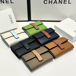 Color Multiple colors available Size 12x10 Loewe’s popular cowhide mid-length wallet Classic style