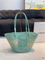 LOEWE. This new straw vegetable basket