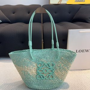 LOEWE. This new straw vegetable basket